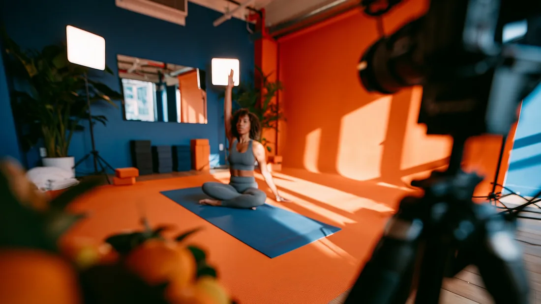 Cover: a creator filming a session in a bright studio
